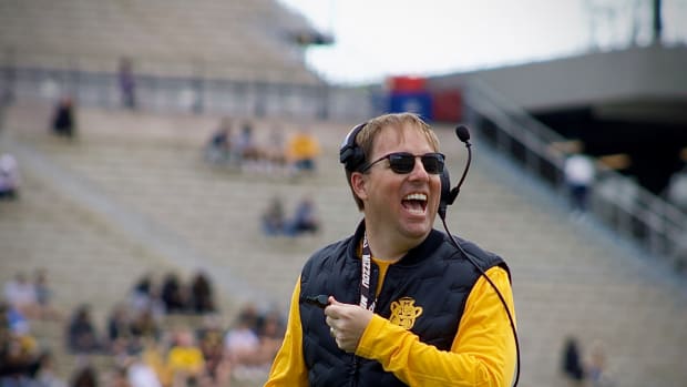 Mar 16, 2024; Columbia, MO, USA; Missouri Tigers coach Eli Drinkwitz smiles at his players on the sidelines during their annual Black & Gold Spring Game at Faurot Field.